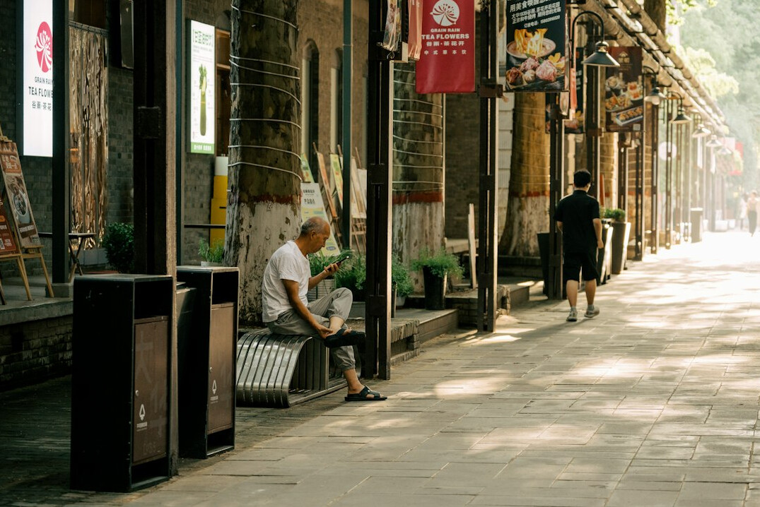 elderly man on bench daily life
